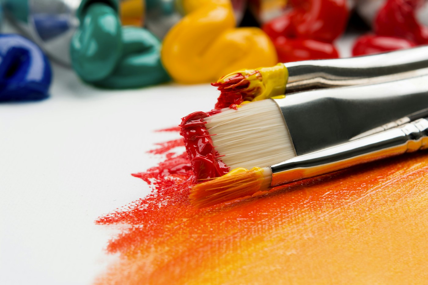 Paint and brushes in an artist’s workspace